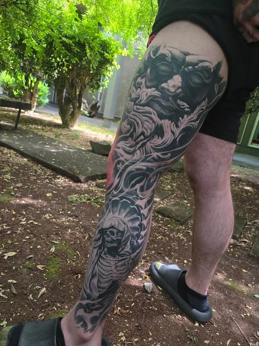 Statue and Santa Muerte full leg sleeve by Gage Cheesman, Alliance Tattoo Eugene Oregon