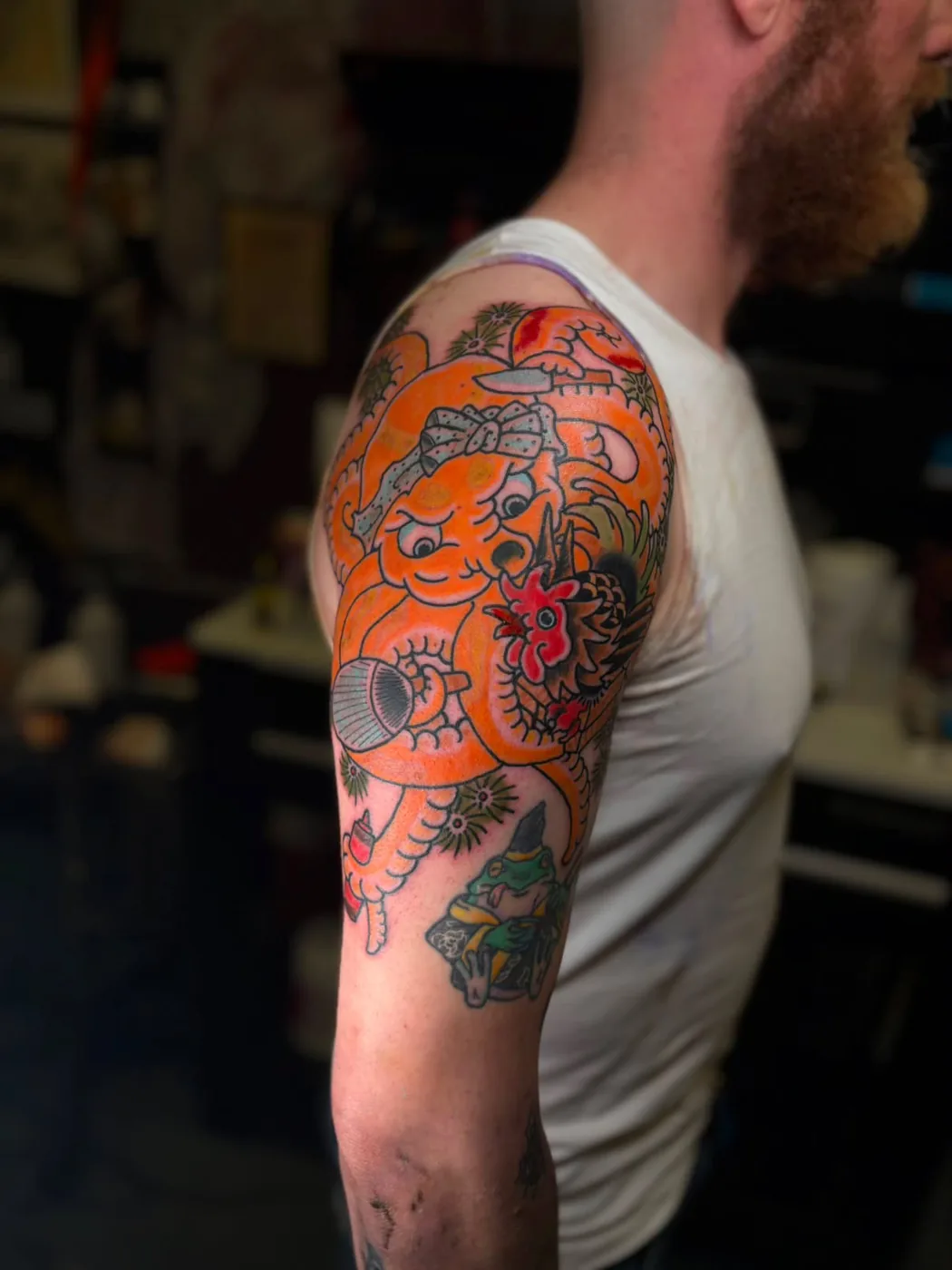 Octopus and rooster color half sleeve by Kaichi Fujita, Alliance Tattoo Eugene Oregon
