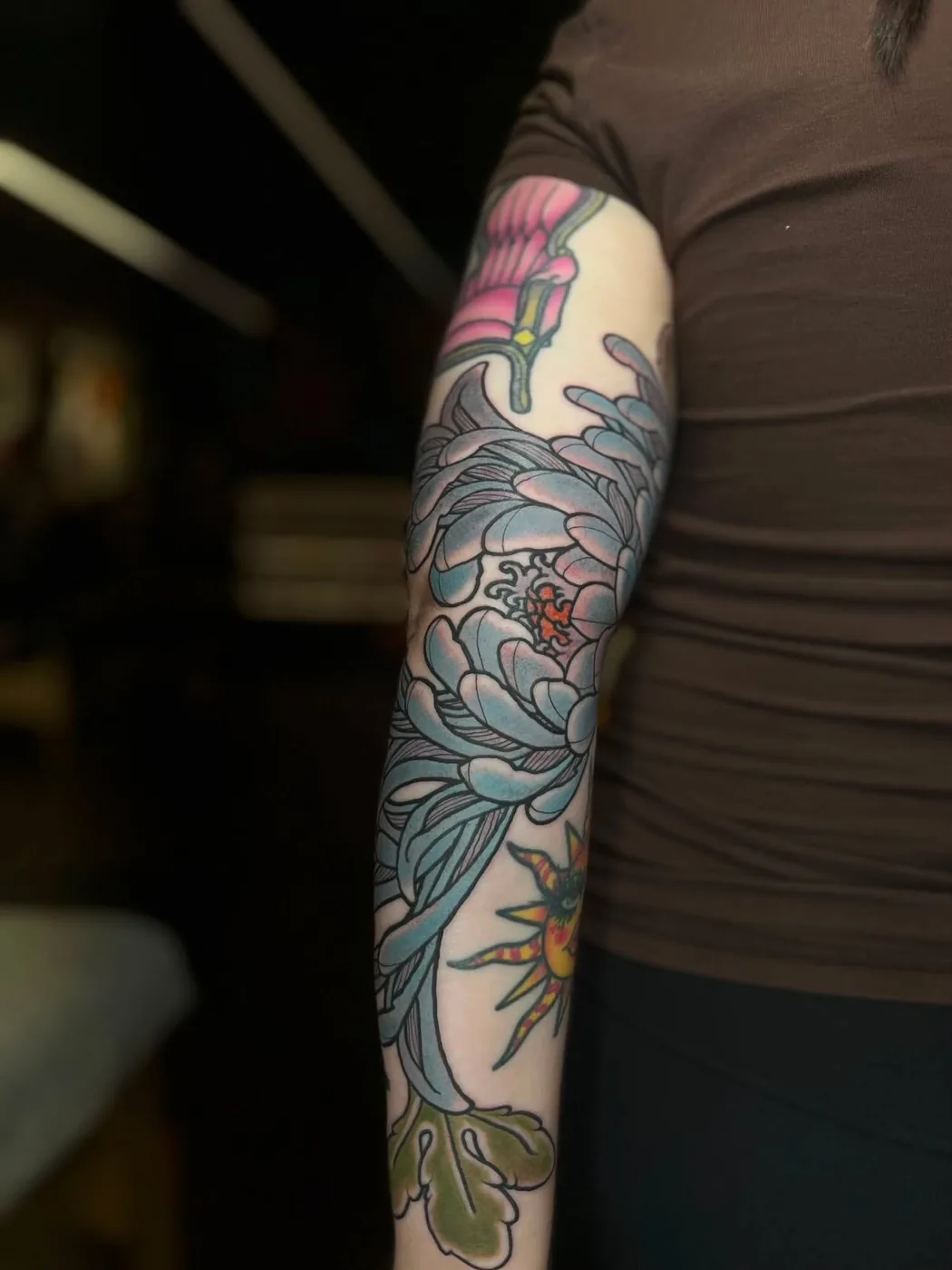 Blue chrysanthemum color sleeve by Kaichi Fujita, Alliance Tattoo Eugene Oregon