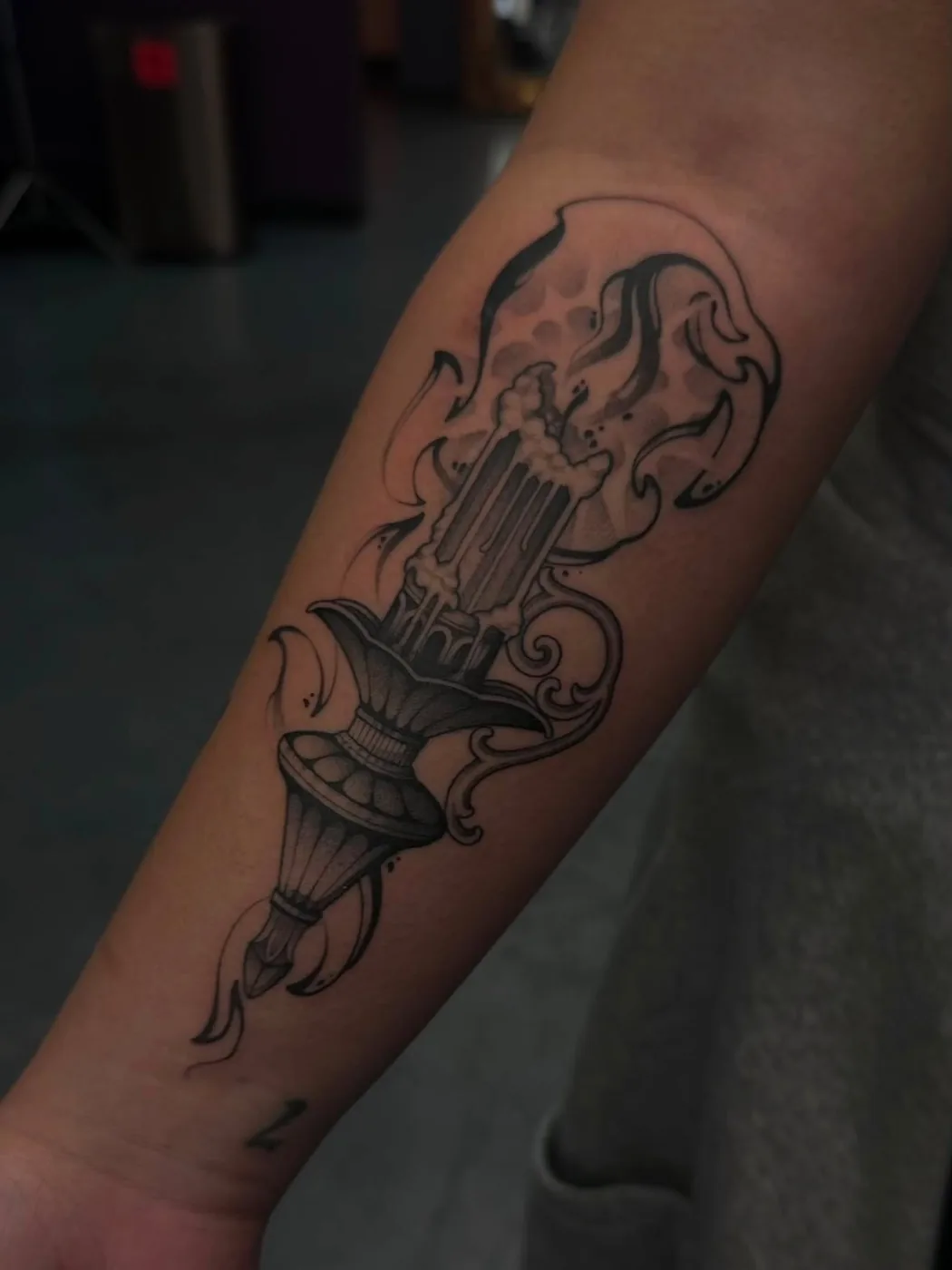 Melting candle sconce by Preston, Alliance Tattoo Eugene Oregon