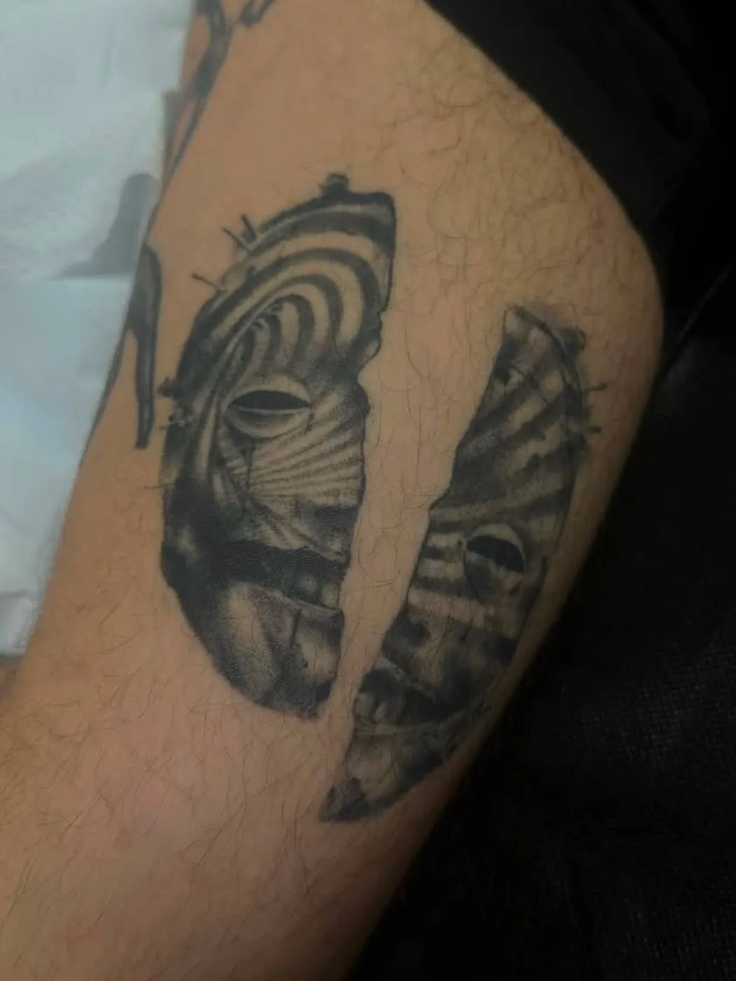 Split spiral mask by Preston, Alliance Tattoo Eugene Oregon